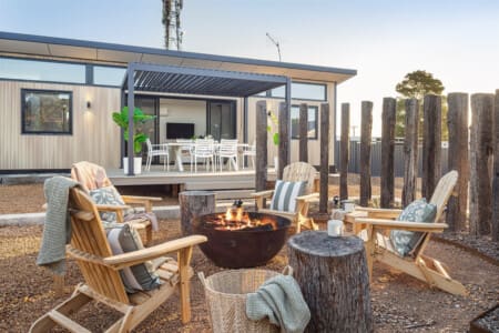 Private Firepit with Outdoor Seating Cushions & Rugs