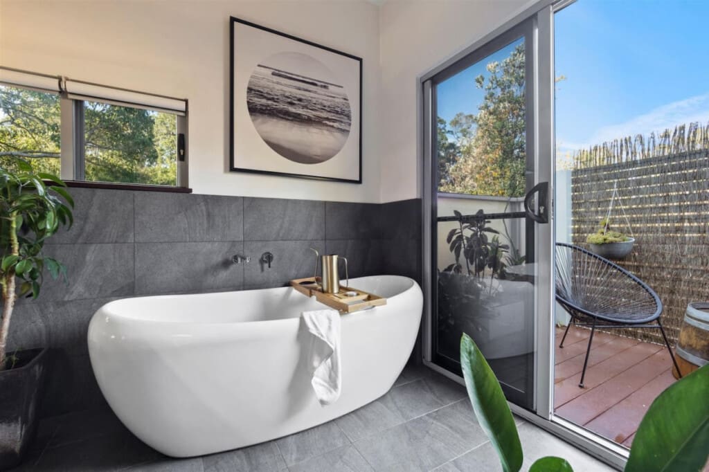 Ensuite bathroom egg-shaped bathtub and Outdoor seating area