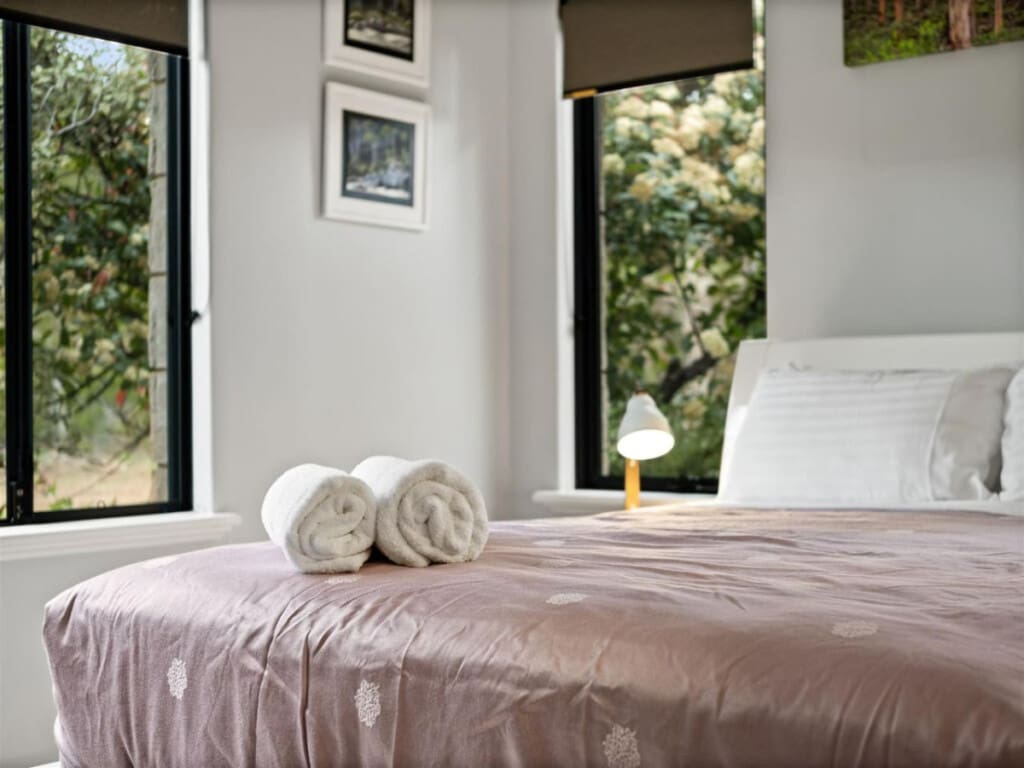 Bedroom 1 - 1 Queen bed, Ceiling fan, En-suite Bathroom and Garden view