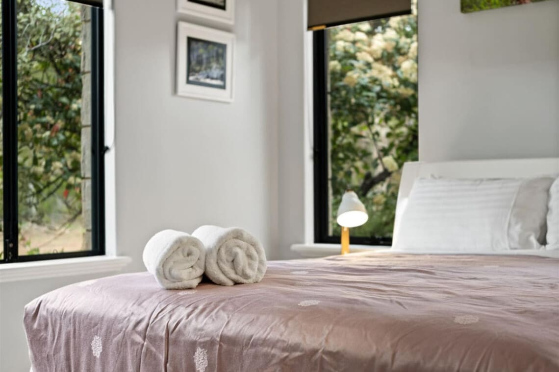 Bedroom 1 - 1 Queen bed, Ceiling fan, En-suite Bathroom and Garden view