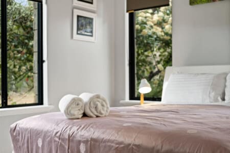 Bedroom 1 - 1 Queen bed, Ceiling fan, En-suite Bathroom and Garden view