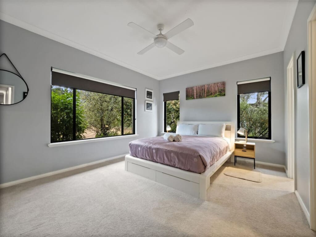 Bedroom 1 - 1 Queen bed, Ceiling fan, En-suite Bathroom and Garden view