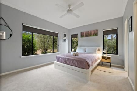 Bedroom 1 - 1 Queen bed, Ceiling fan, En-suite Bathroom and Garden view