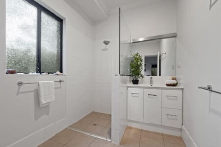 Bedroom 1 - 1 Queen bed, Ceiling fan, En-suite Bathroom and Garden view