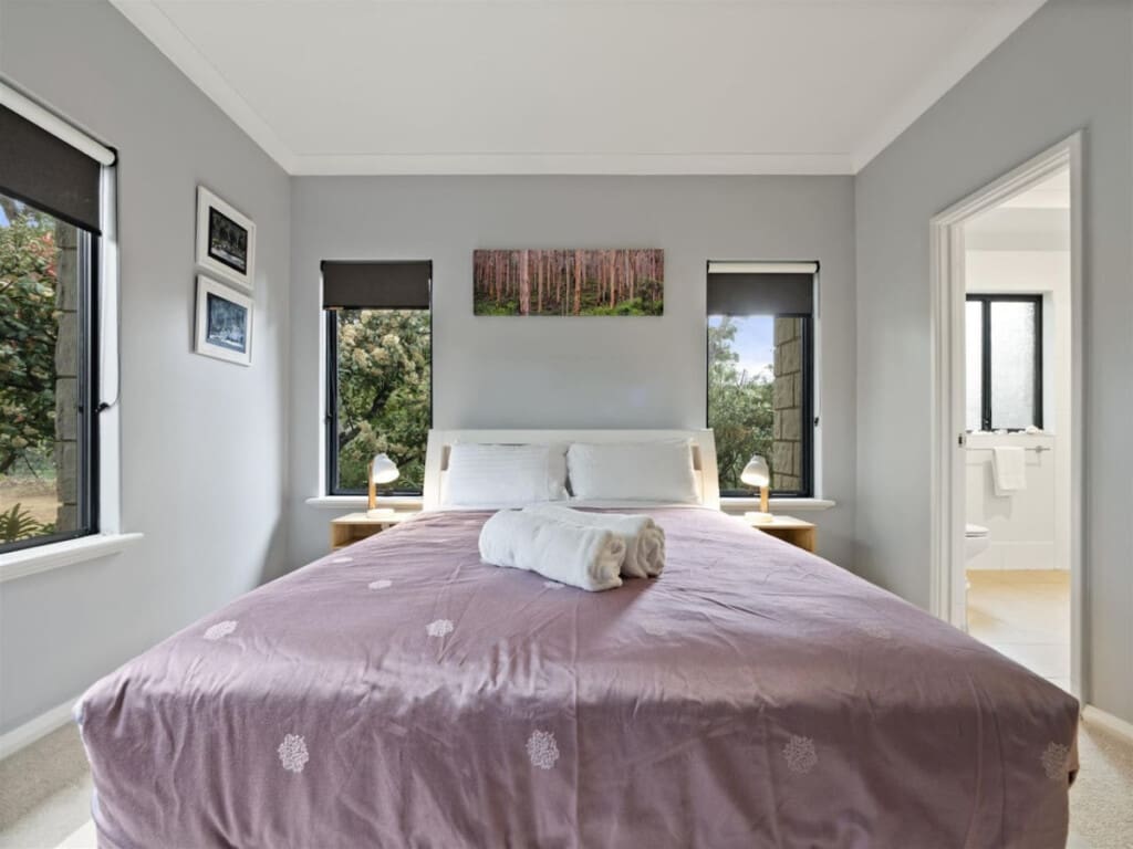Bedroom 1 - 1 Queen bed, Ceiling fan, En-suite Bathroom and Garden view