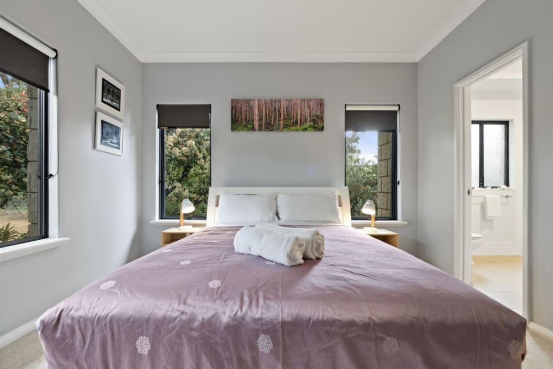 Bedroom 1 - 1 Queen bed, Ceiling fan, En-suite Bathroom and Garden view