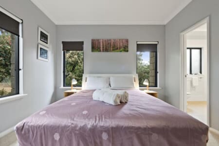 Bedroom 1 - 1 Queen bed, Ceiling fan, En-suite Bathroom and Garden view