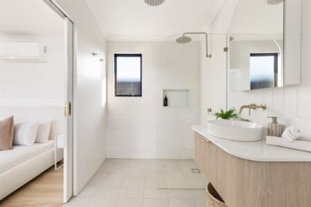 Ensuite Family Bathroom with Shower, Lit Make Up Mirror, Hairdryer, Designer Vanity and Toilet