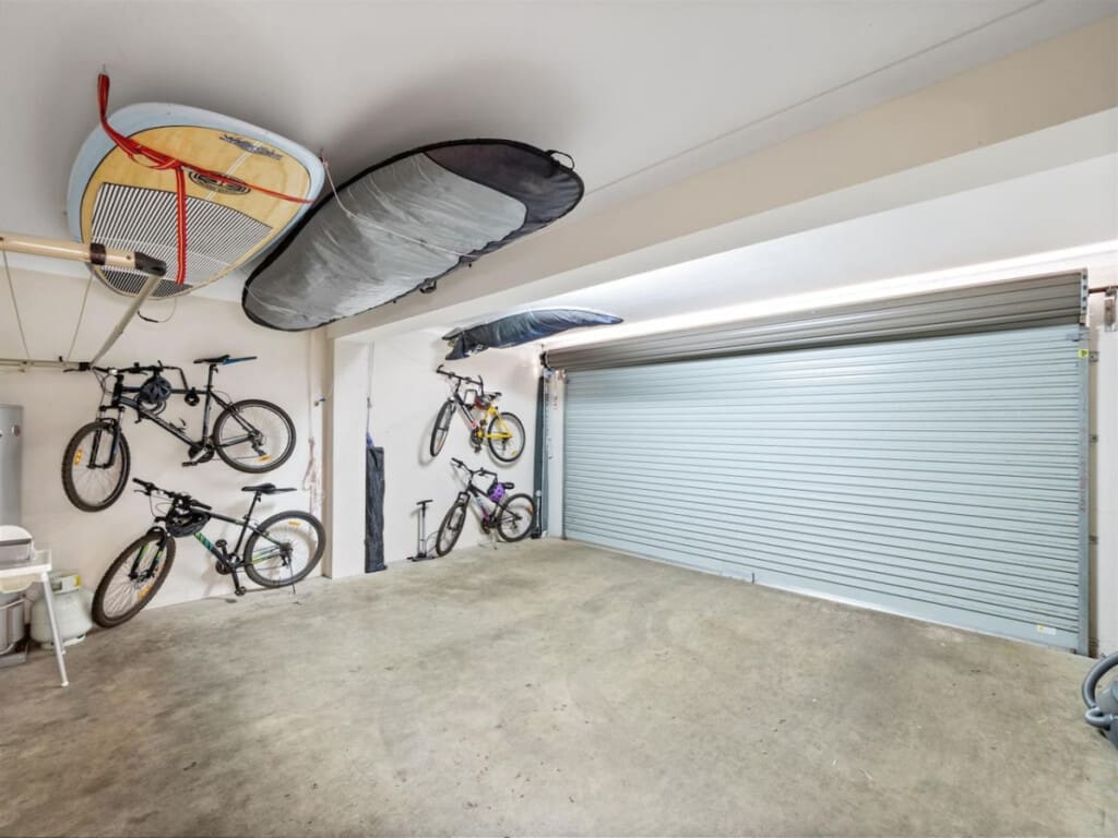 Remote-controlled garage for 2 cars and a BBQ grill.