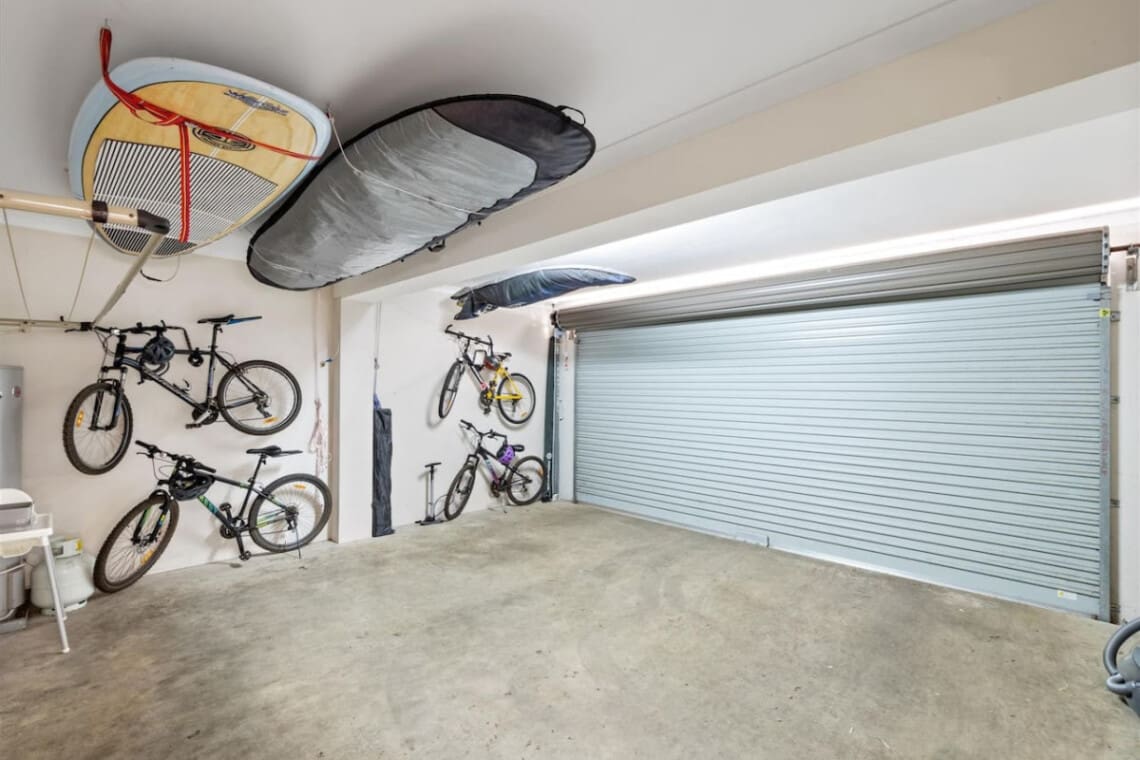 Remote-controlled garage for 2 cars and a BBQ grill.