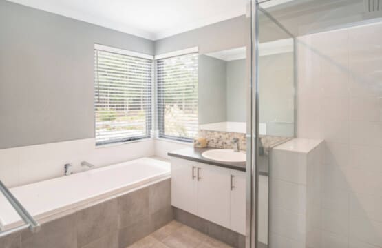 Bathroom 2 - Shower head, Tub and Hair Dryer (Under the Sink)