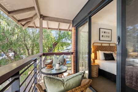 Bedroom 1 - 1 Queen bed, Balcony & Seating Area