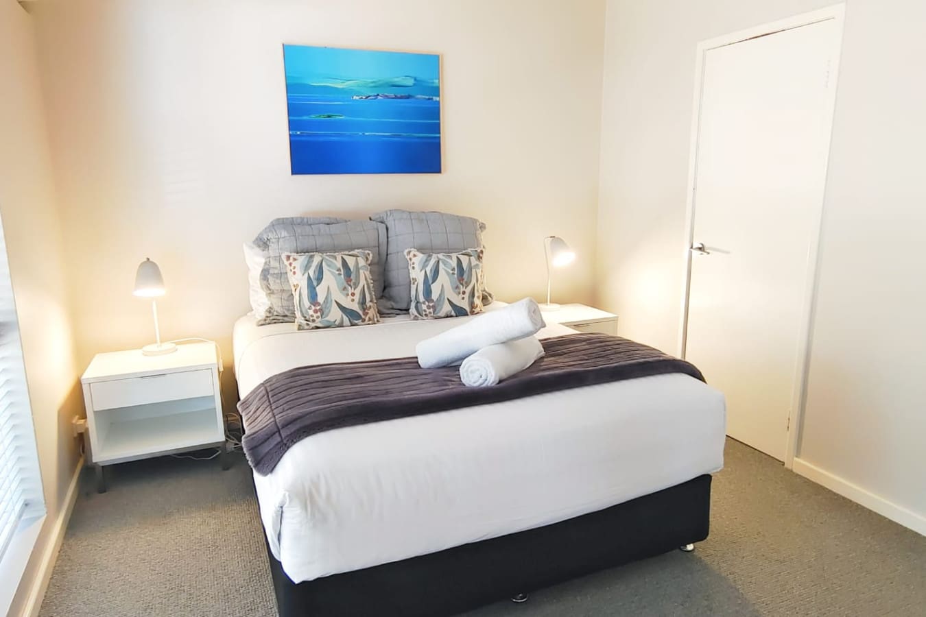 Bedroom 1 - 1 Queen Bed, Ensuite Bathroom, Walk-in Robe, and Ceiling Fan