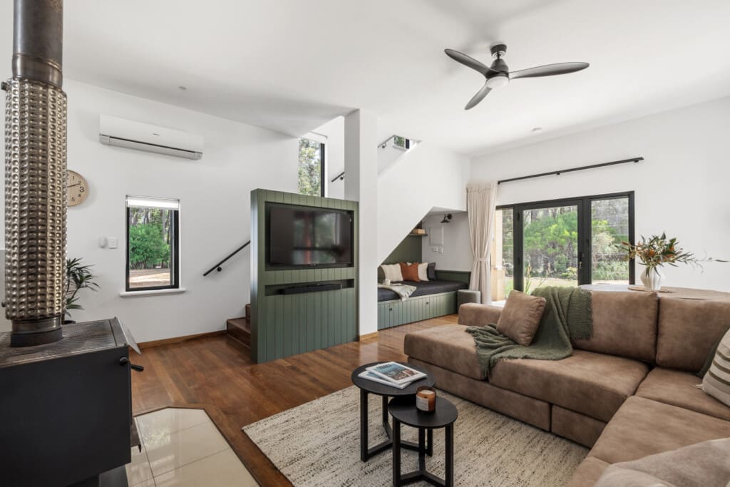 Living room, Reading nook, Fireplace, TV, Dining table, Stairs & Reverse-cycle Airconditioning