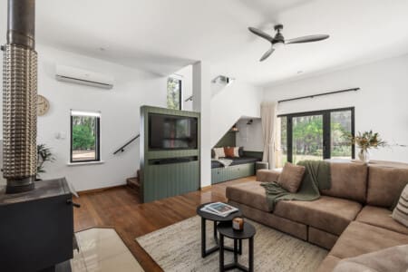 Living room, Reading nook, Fireplace, TV, Dining table, Stairs & Reverse-cycle Airconditioning