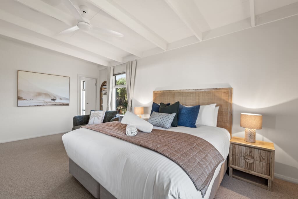 Bedroom 1 – 1 King Bed – Upstairs, with ceiling fan, ensuite bathroom, and walk-in wardrobe